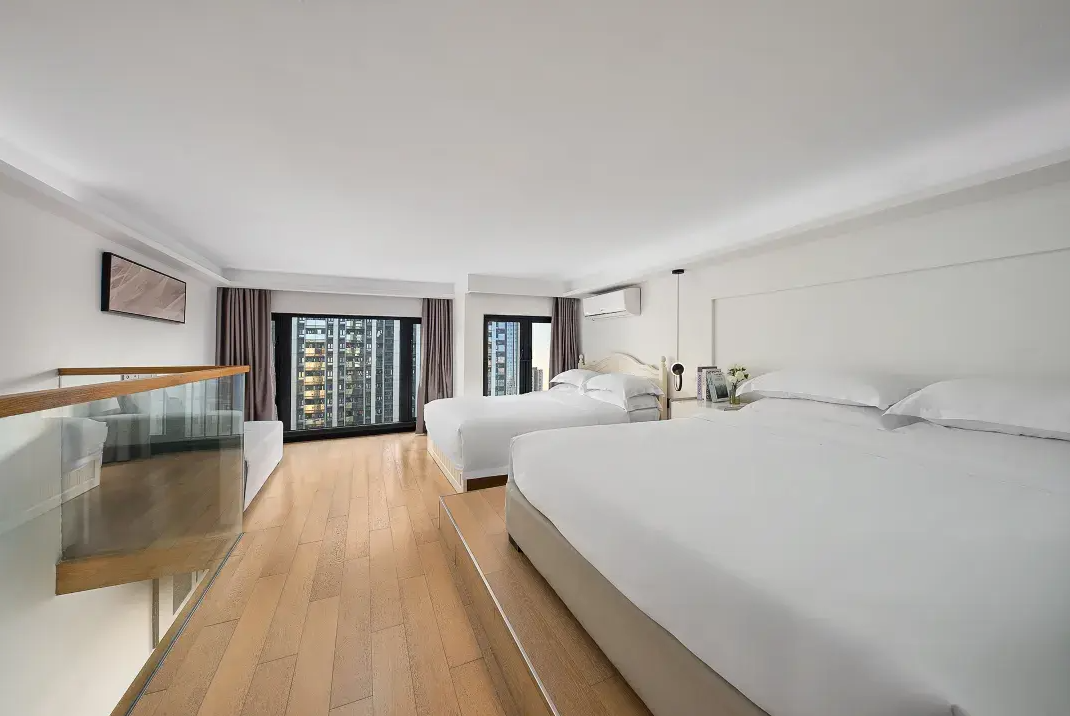 View 1-bedroom apartment in Futian, Shenzhen | Loft Family Two King-Size Bed Apartment (High-rise Night View | Refrigerator | Washing Machine | Supermarket on the Ground Floor) in Zhijian Hotel — Photo 3 of 7